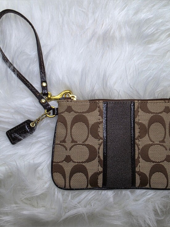 Coach Handbags - Coach Signature Canvas Wristlet in Brown